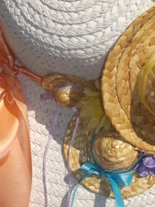 close-up detail of the many hats on the spring hat wreath
